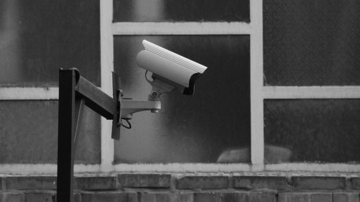 Bullet security camera mounted on a building wall